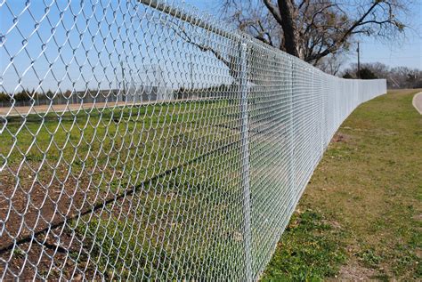 chainlink vs post and rail cost switf chainlink T-Town Fence & Gate Wood Fence with Chain Link in Tulsa, OK